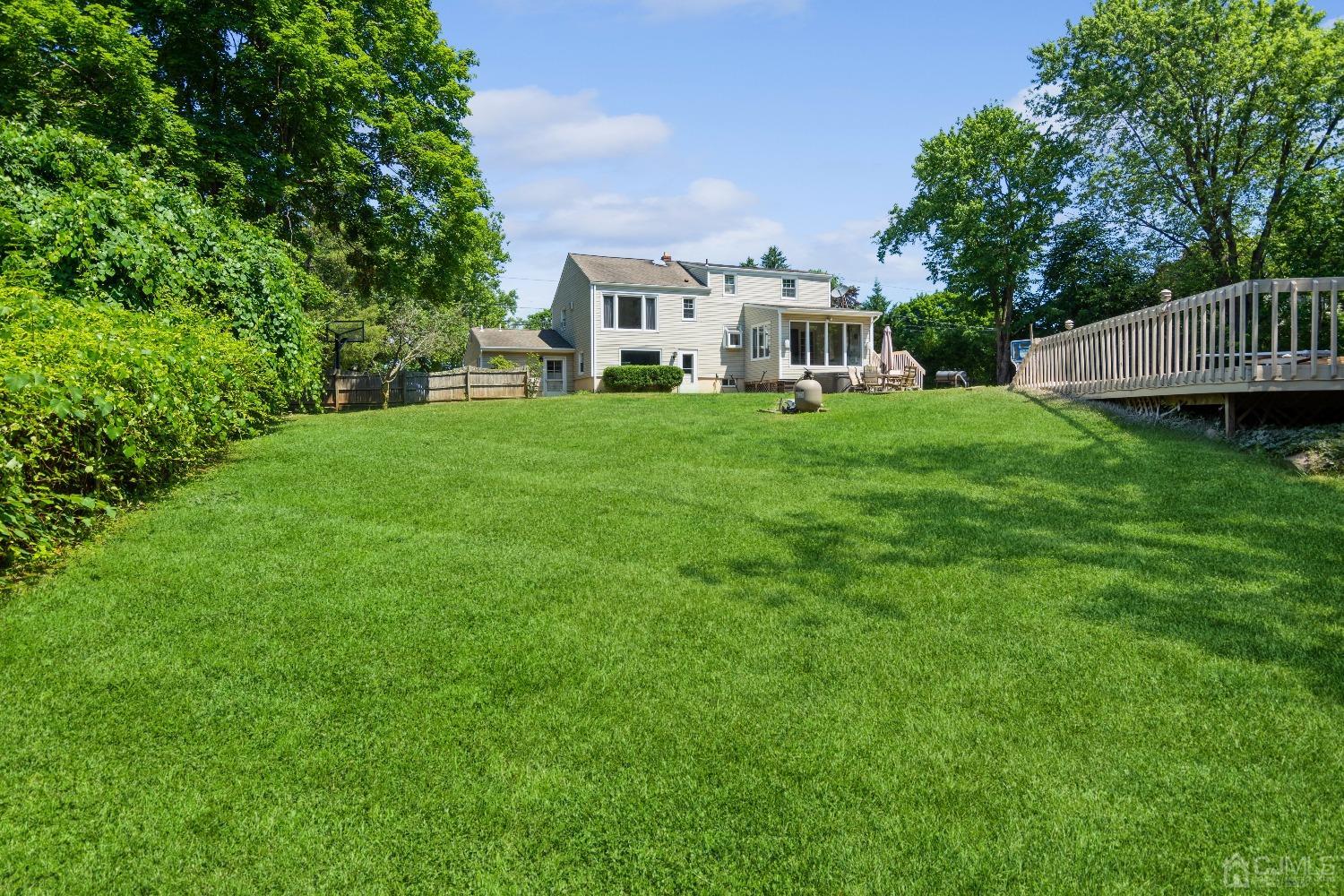 141 Overbrook Road Piscataway, NJ 08854 - Photo 7 of 38 a front view of a house with yard and green space