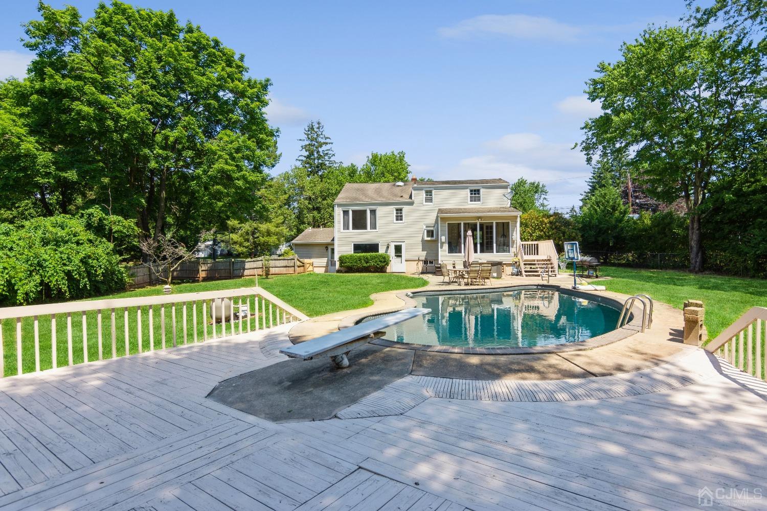 141 Overbrook Road Piscataway, NJ 08854 - Photo 8 of 38 a view of swimming pool with a small yard