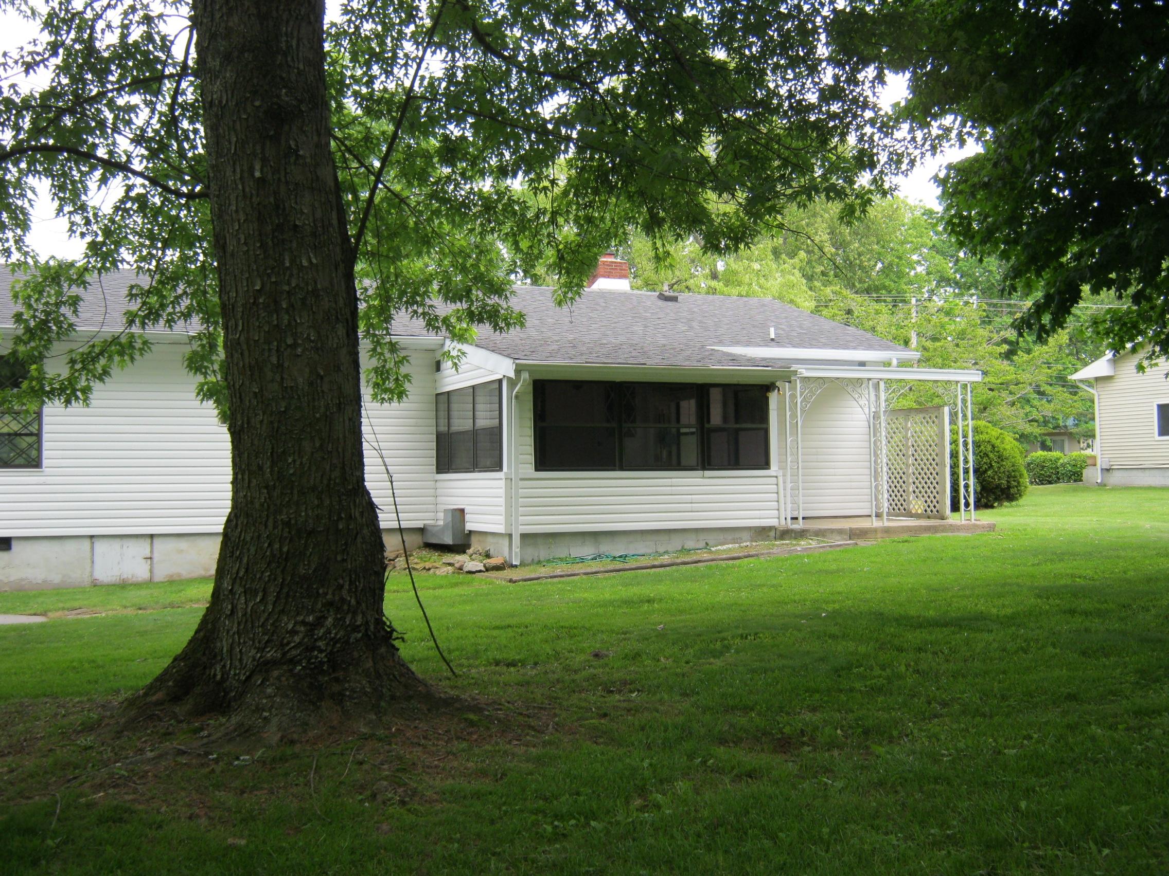 Back of House sunroom]