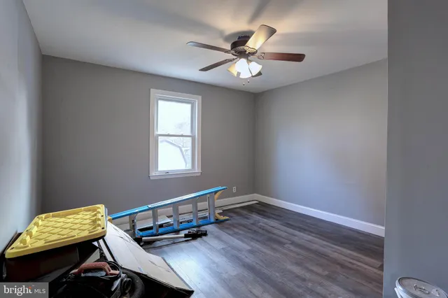 a room with furniture and a window