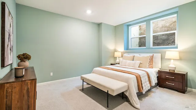 a view of residential houses with outdoor space