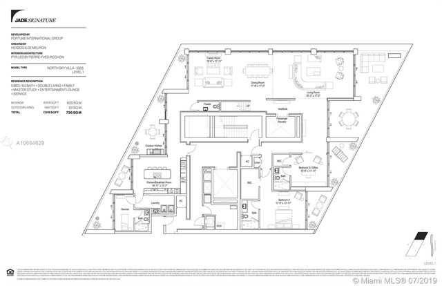 a room with lot of large windows and couch