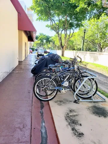 a view of a chair and tables in the patio