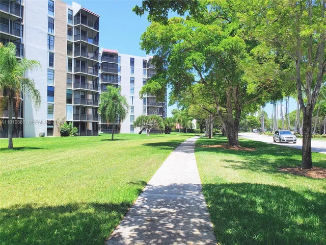 a room with furniture and a fireplace
