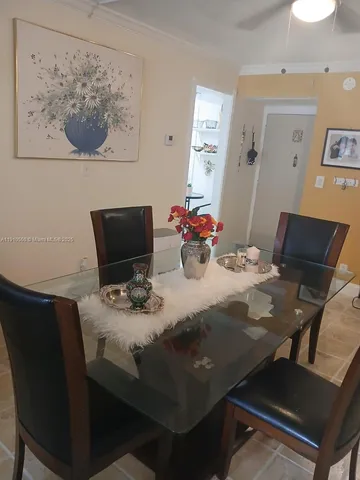 a view of a dining room with furniture