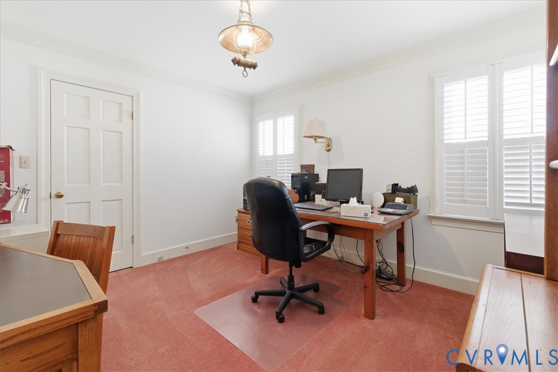 37023 Old Wakefield Road Wakefield, VA 23888 - Photo 29 of 51 a view of a workspace with furniture and a window