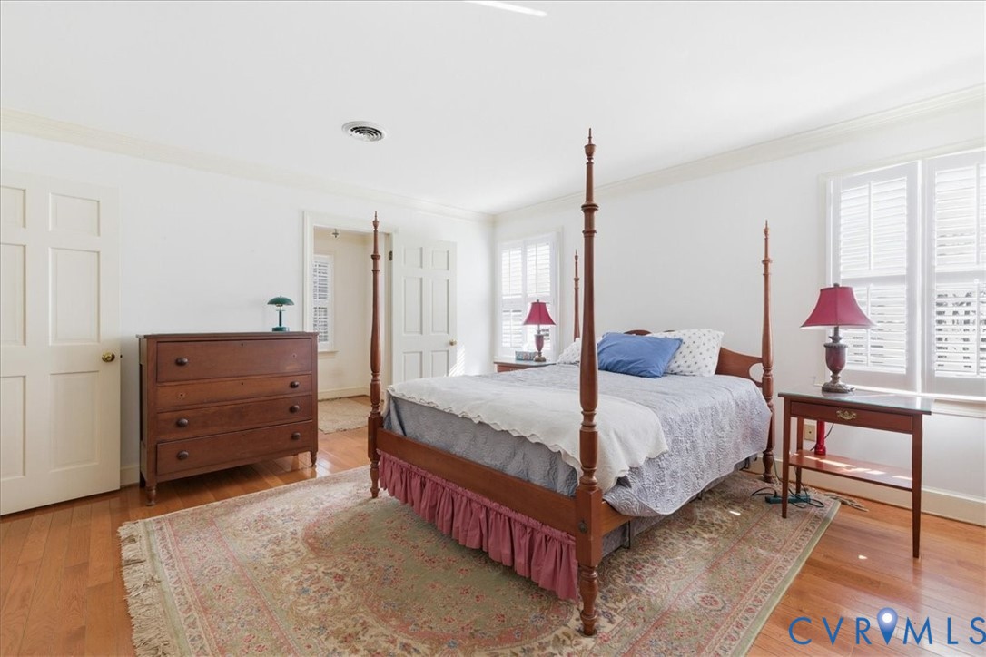 37023 Old Wakefield Road Wakefield, VA 23888 - Photo 33 of 51 a bedroom with a bed and a dresser