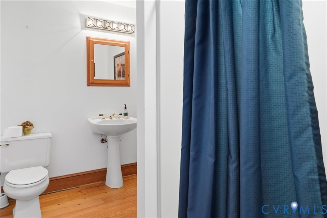 37023 Old Wakefield Road Wakefield, VA 23888 - Photo 42 of 51 a bathroom with a sink and a toilet