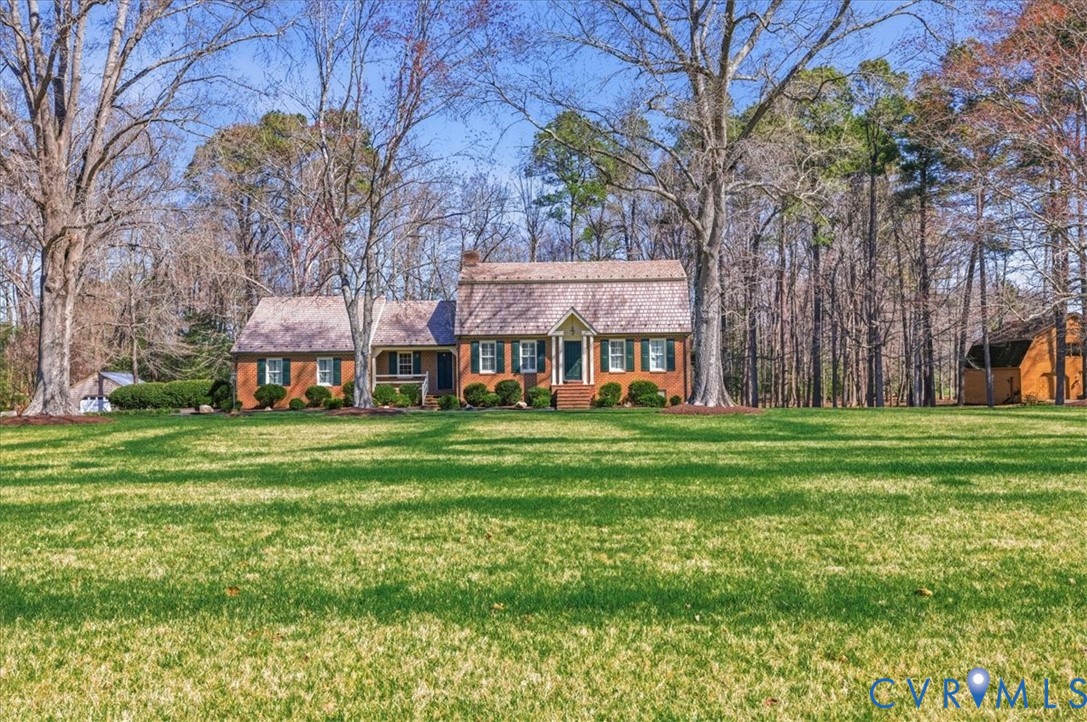 37023 Old Wakefield Road Wakefield, VA 23888 - Photo 47 of 51 a view of a big yard with plants and large trees