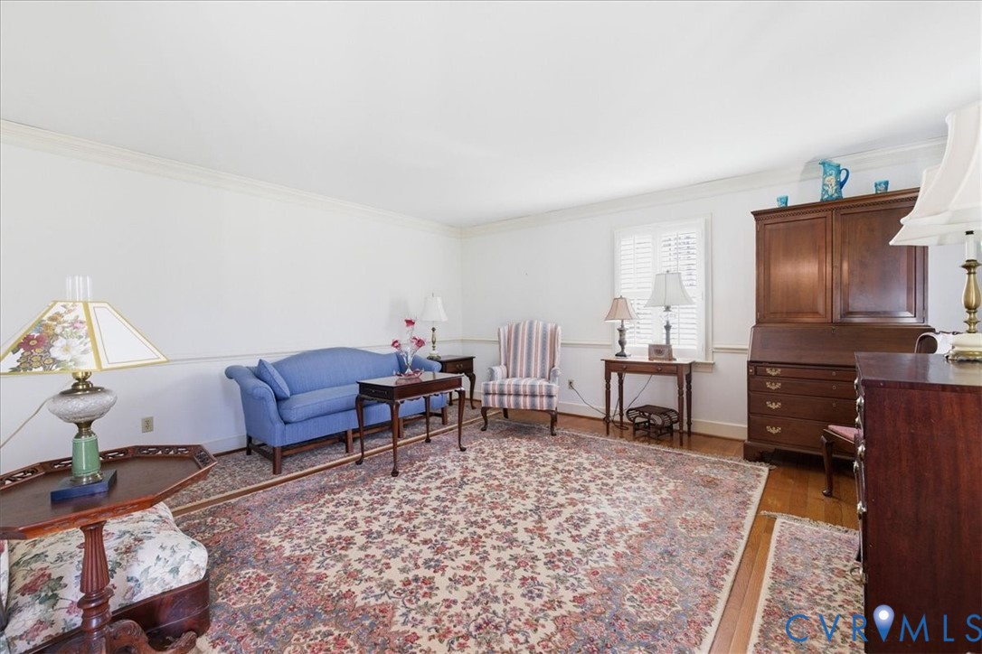 37023 Old Wakefield Road Wakefield, VA 23888 - Photo 8 of 51 a living room with furniture a rug and a piano