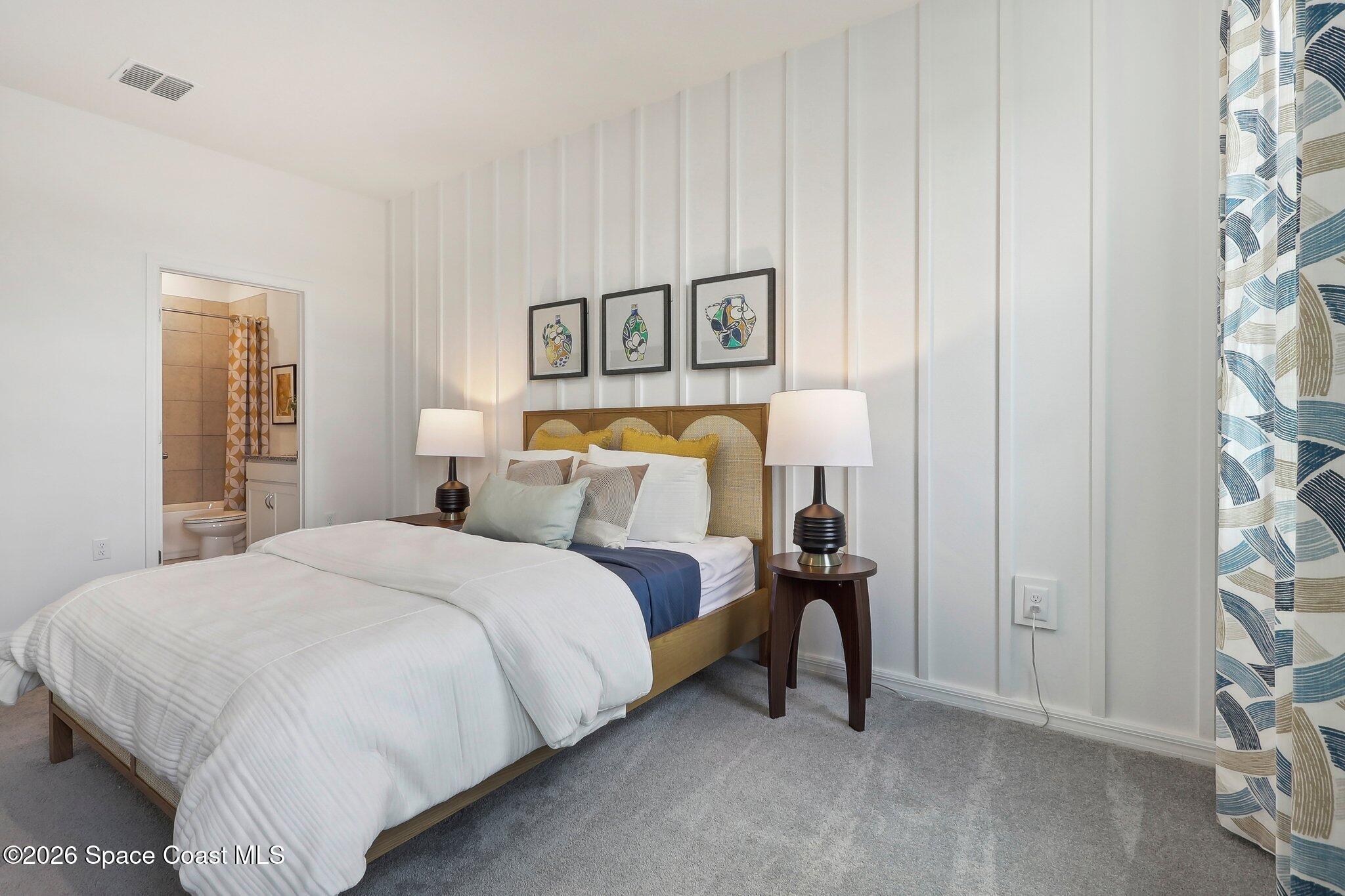 1332 Dunblane Way Northeast Palm Bay, FL 32905 - Photo 28 of 32 a bedroom with a bed and a window