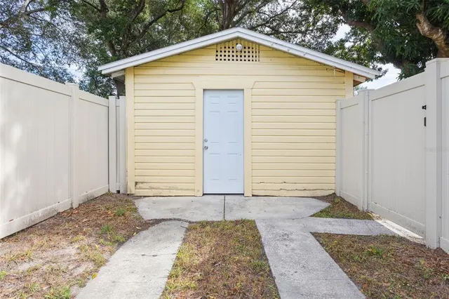 a view of a backyard of house