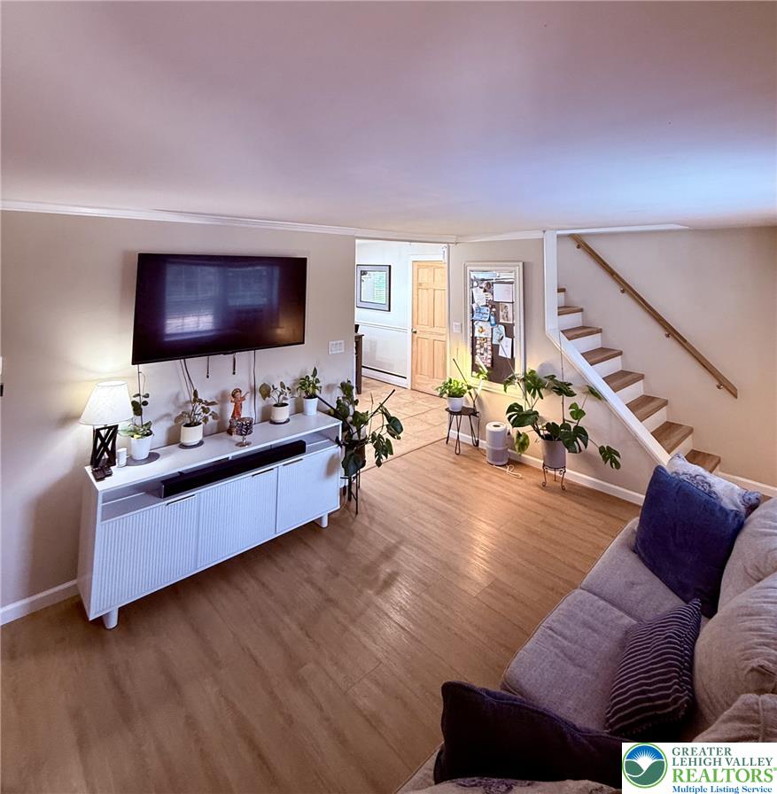 1275 Macada Road Bethlehem, PA 18017 - Photo 22 of 87 a living room with furniture and a flat screen tv
