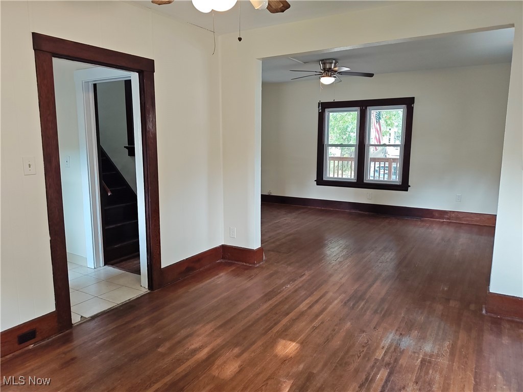 5213 Reed Avenue Ashtabula, OH 44004 - Photo 14 of 35 Unfurnished room featuring wood finished floors and a ceiling fan