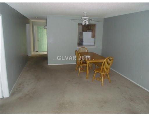 7100 West Pirates Cove Road, Unit 1003 Las Vegas, NV 89145 - Photo 2 of 7 Living Room.