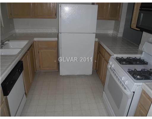 7100 West Pirates Cove Road, Unit 1003 Las Vegas, NV 89145 - Photo 3 of 7 Kitchen.
