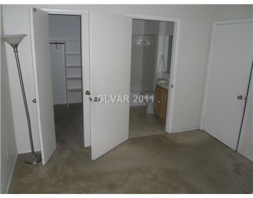 7100 West Pirates Cove Road, Unit 1003 Las Vegas, NV 89145 - Photo 4 of 7 Master Bedroom.