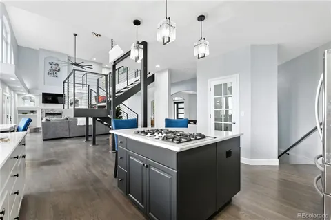 a kitchen that has a lot of cabinets in it