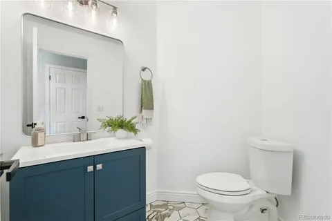 a bathroom with a sink and a toilet