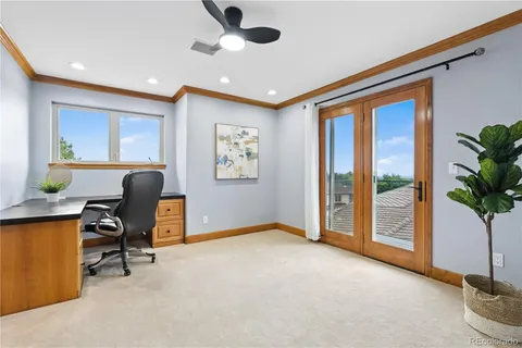 a workspace with furniture and a window