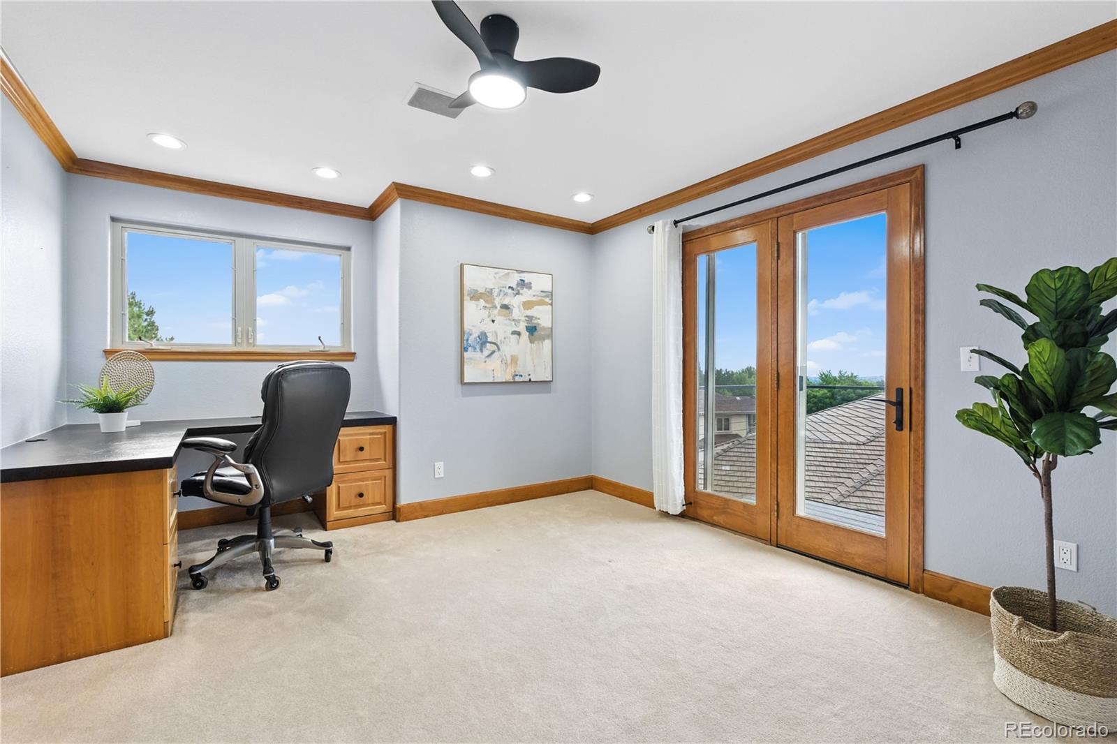 7092 Secrest Court Arvada, CO 80007 - Photo 33 of 49 a workspace with furniture and a window