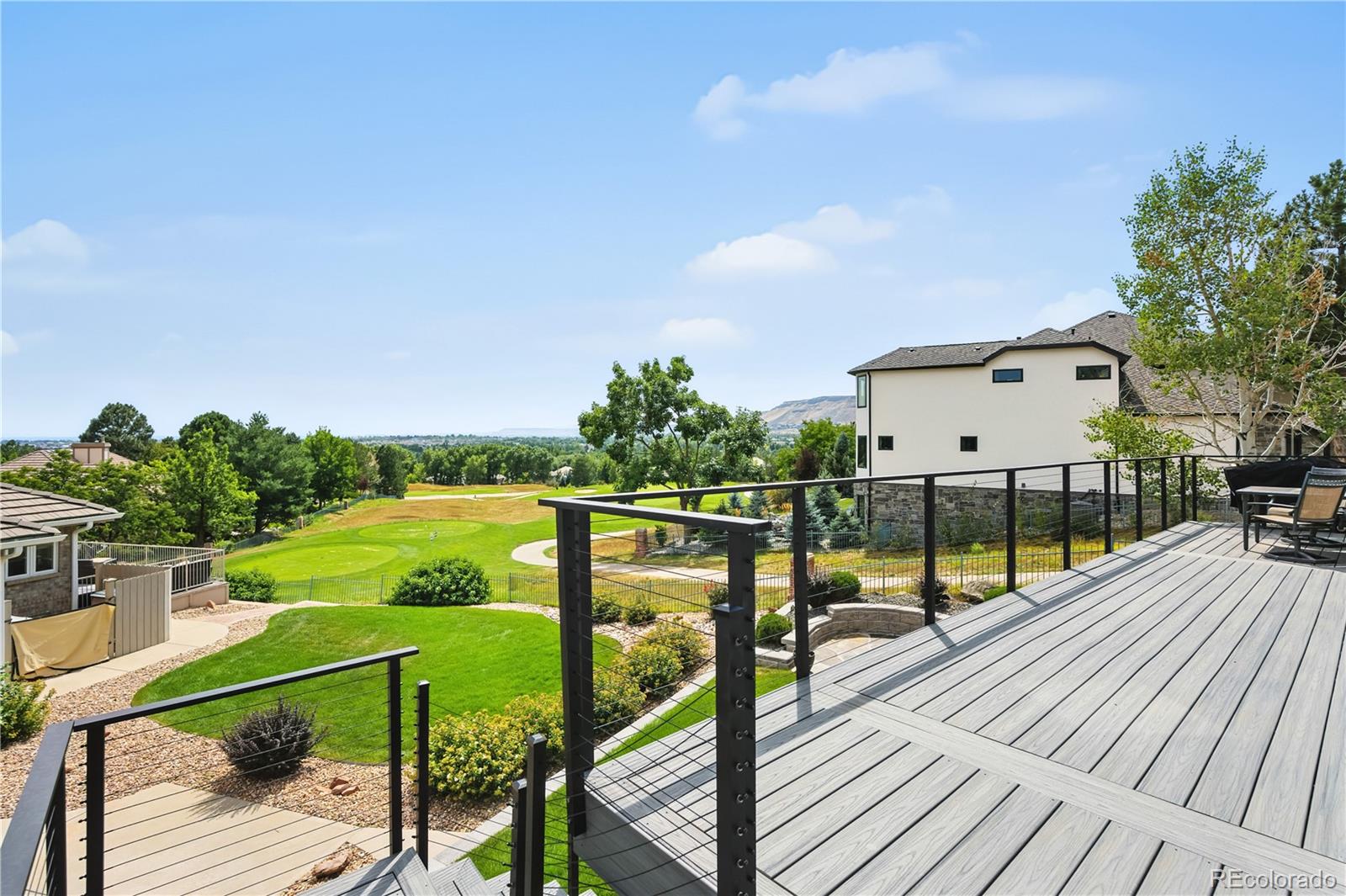 7092 Secrest Court Arvada, CO 80007 - Photo 44 of 49 a view of a balcony with wooden floor