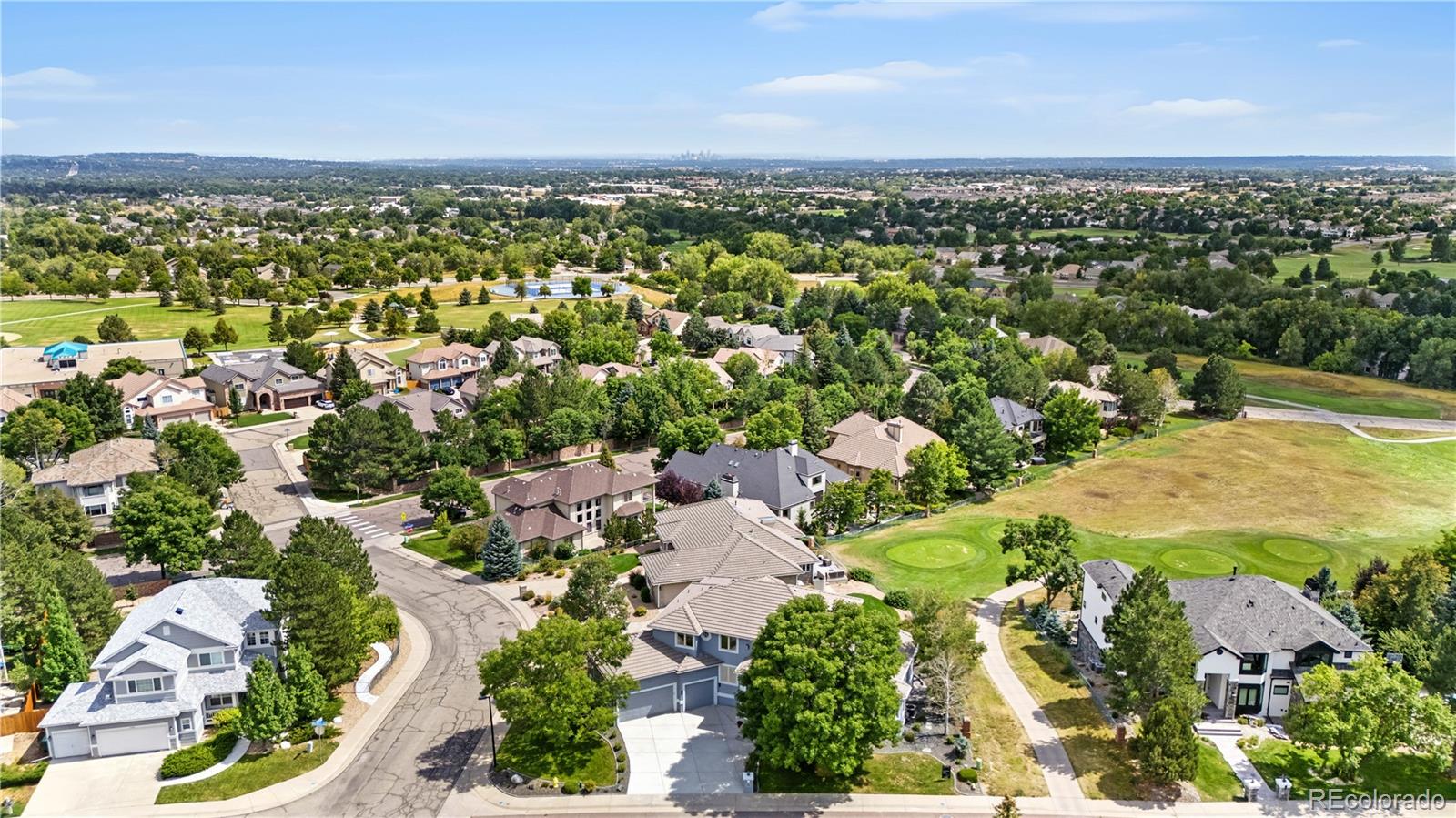 7092 Secrest Court Arvada, CO 80007 - Photo 48 of 49 an aerial view of residential houses with outdoor space