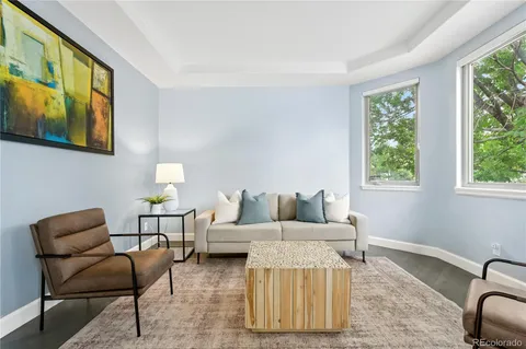 a living room with furniture and window