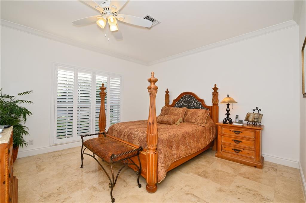 2 Compass Lane Fort Lauderdale, FL 33308 - Photo 23 of 43 a bedroom with a bed and a window