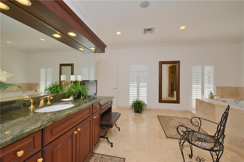2 Compass Lane Fort Lauderdale, FL 33308 - Photo 28 of 43 a spacious bathroom with a granite countertop sink and a bathtub