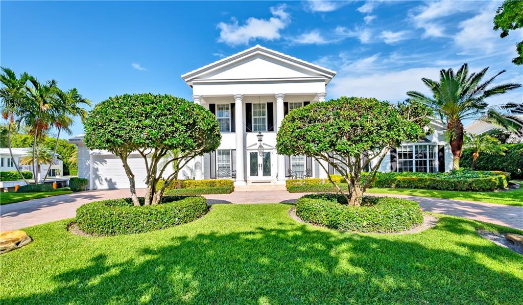 2 Compass Lane Fort Lauderdale, FL 33308 - Photo 3 of 43 a front view of a house with garden