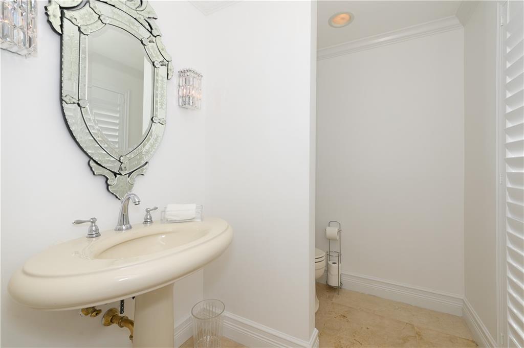 2 Compass Lane Fort Lauderdale, FL 33308 - Photo 10 of 43 a bathroom with a sink and a mirror