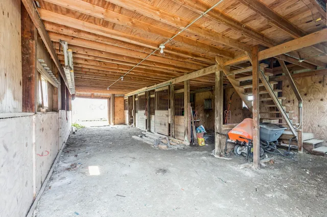 a view of a room with wooden deck