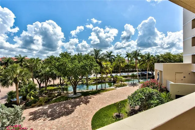 a view of a yard with swimming pool