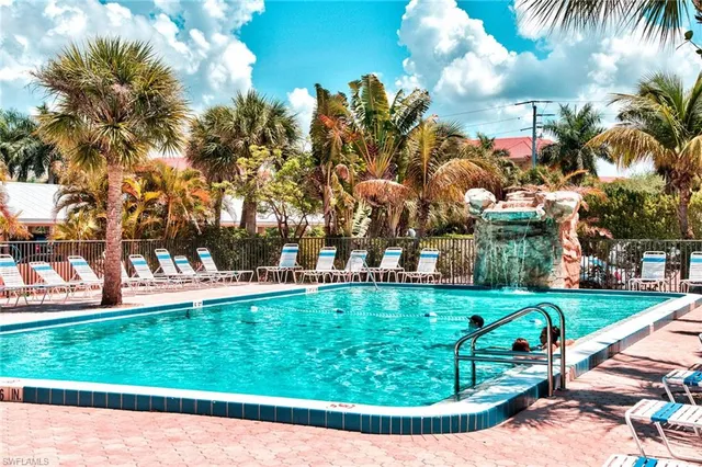 a view of a park with large trees