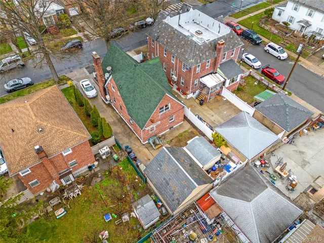 an aerial view of a city with lots of residential buildings