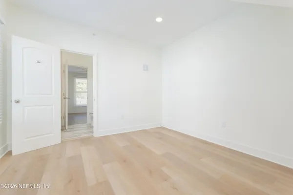 a bath room with a toilet and a bath tub