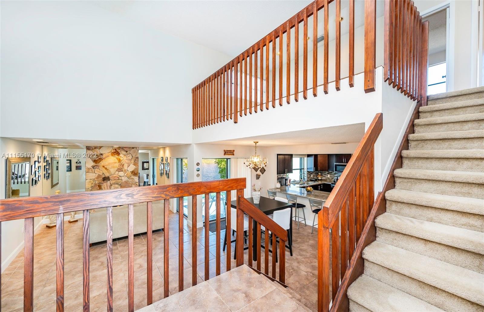 14853 Southwest 42nd Lane Miami, FL 33185 - Photo 17 of 28 a view of entryway with wooden floor