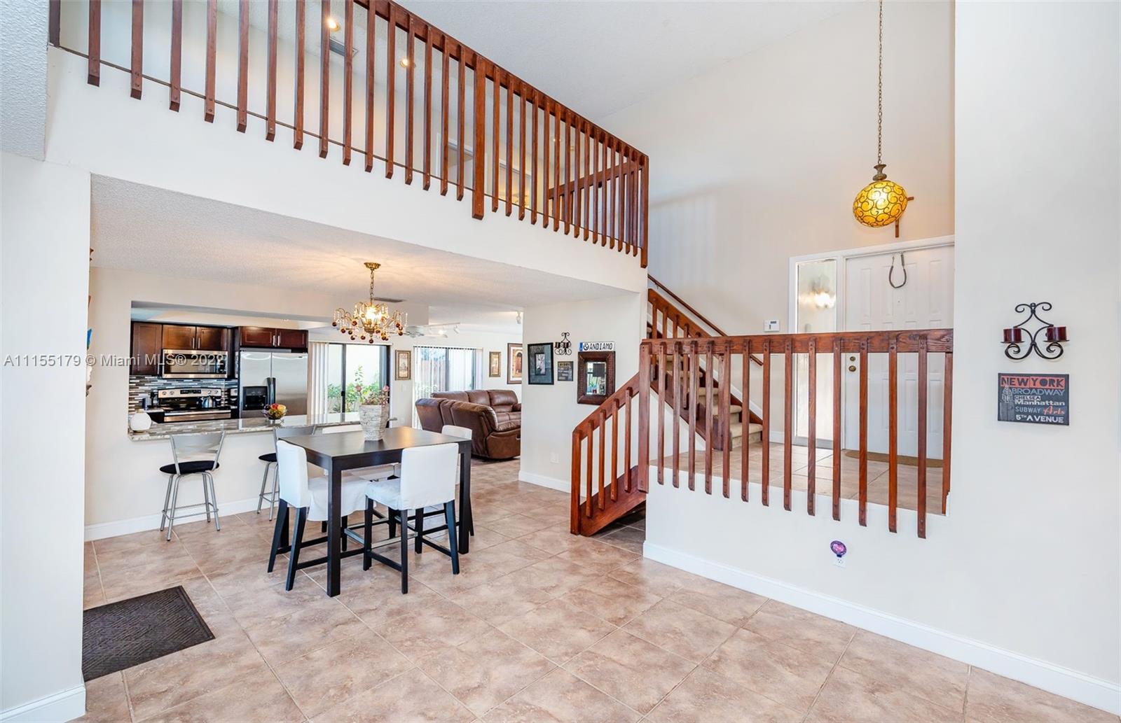 14853 Southwest 42nd Lane Miami, FL 33185 - Photo 18 of 28 a view of a dining room with furniture
