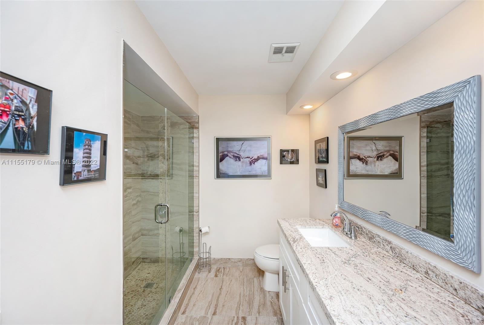 14853 Southwest 42nd Lane Miami, FL 33185 - Photo 24 of 28 a view of a bathroom with bathtub and shower