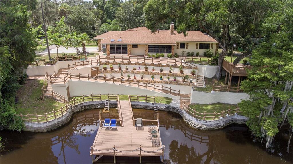 7244 Alafia Ridge Loop Riverview, FL 33569 - Photo 1 of 1 Approx. 150 feet on the Alafia River with serene, open deck for sunning and elevated, treed deck for outdoor grilling.