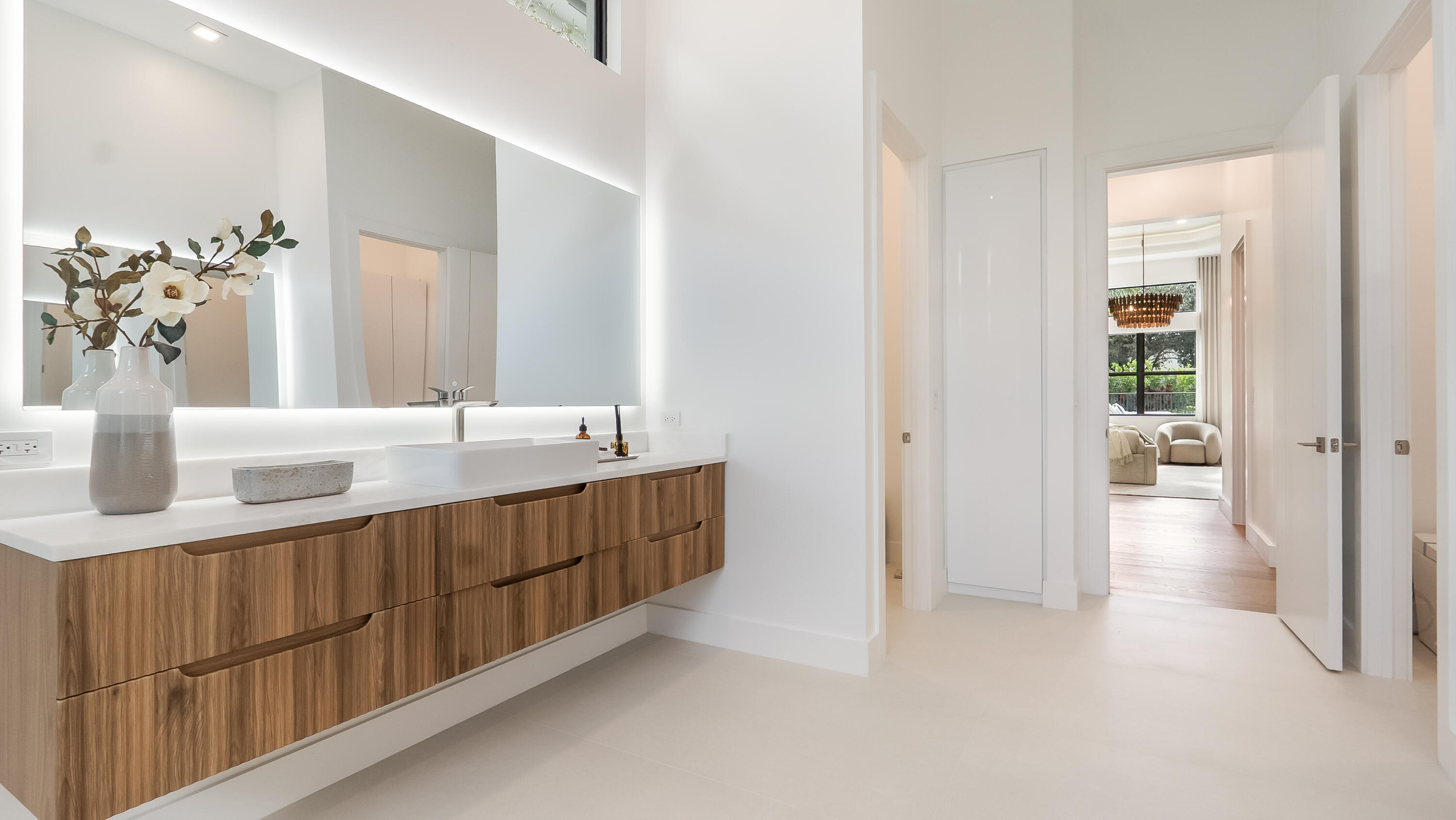 17400 Rosella Road Boca Raton, FL 33496 - Photo 30 of 94 a bathroom with a double vanity sink and a mirror