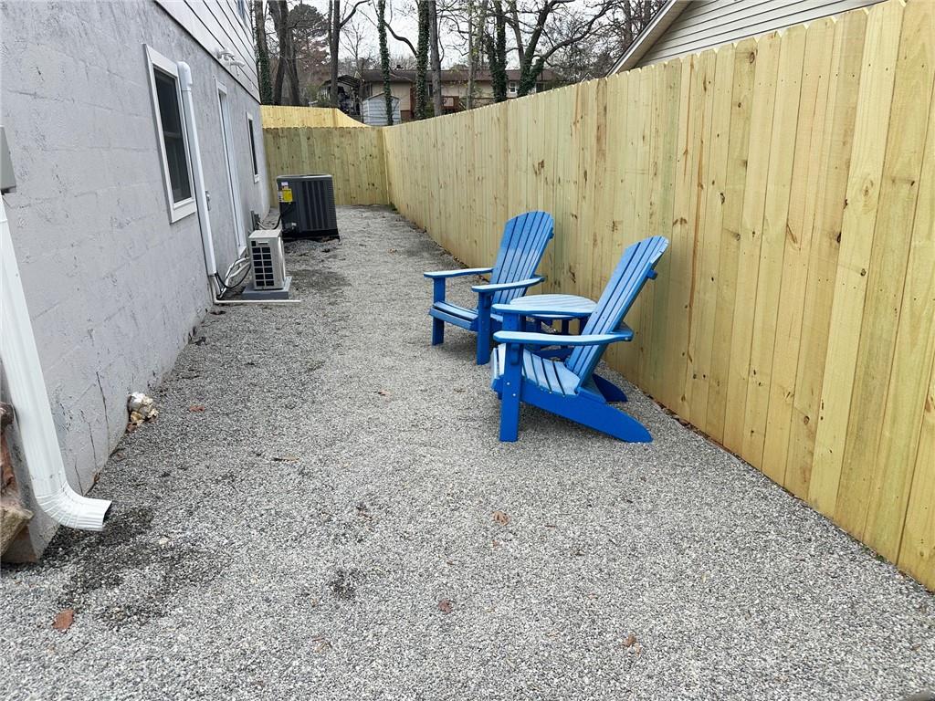 3405 Still Road Cumming, GA 30041 - Photo 23 of 28 a view of a backyard with chairs