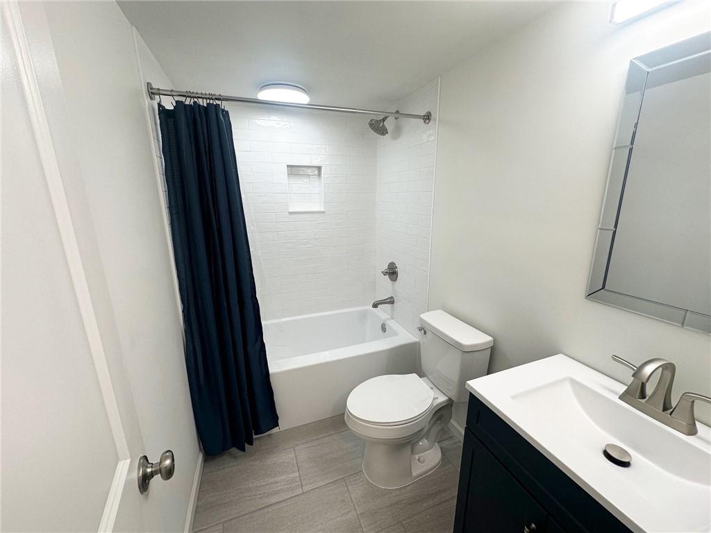 3405 Still Road Cumming, GA 30041 - Photo 28 of 28 a bathroom with a sink toilet and shower