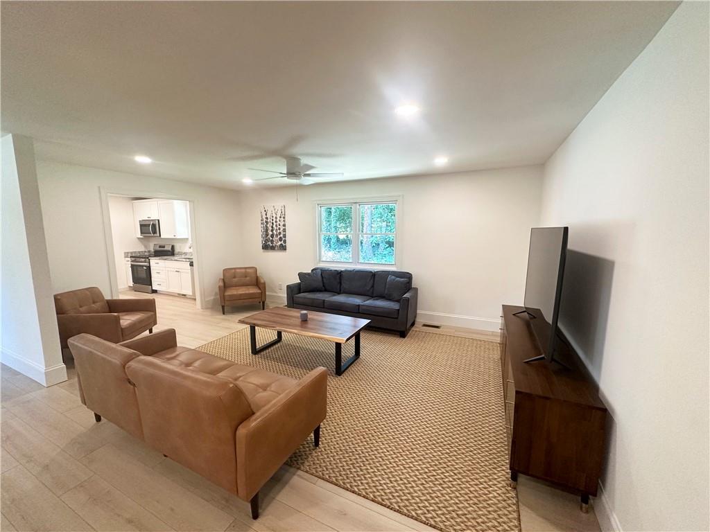 3405 Still Road Cumming, GA 30041 - Photo 5 of 28 a living room with furniture