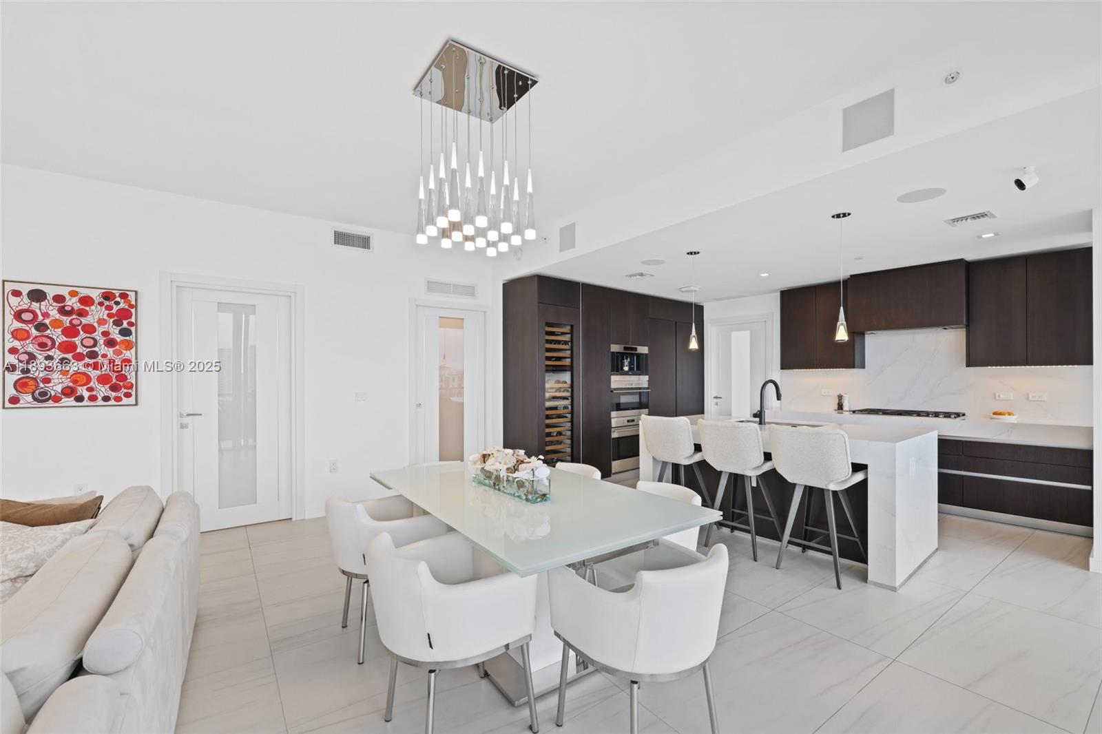 2200 North Ocean Boulevard, Unit N504 Fort Lauderdale, FL 33305 - Photo 11 of 43 a view of a dining room with furniture