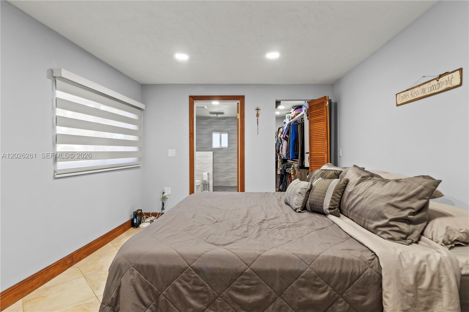 6250 Southwest 20th Terrace Miami, FL 33155 - Photo 28 of 42 a bedroom with a bed and a window