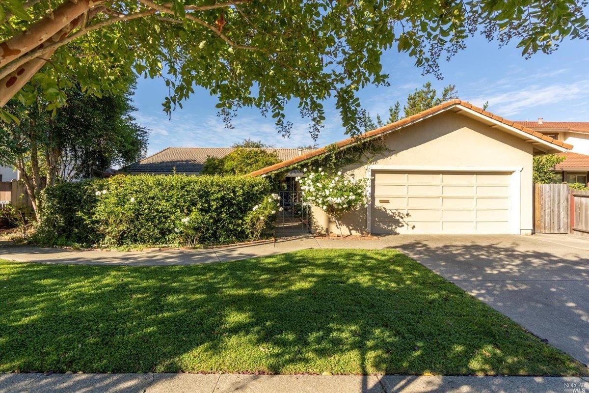 275 Beech Avenue Santa Rosa, CA 95409 - Photo 1 of 1 a front view of a house with a yard