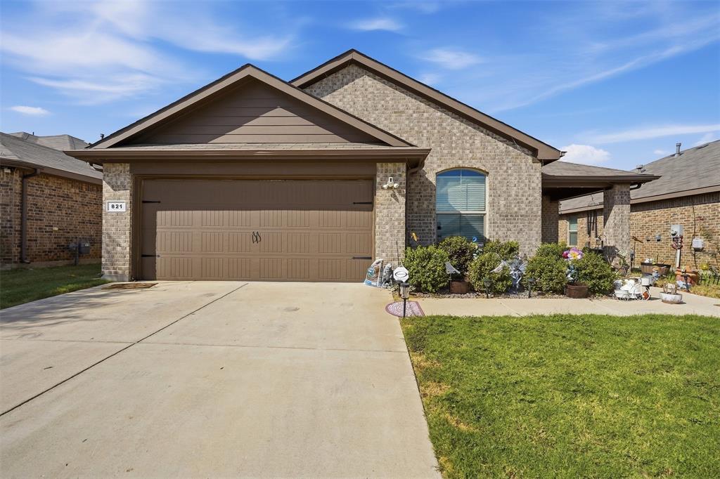 821 Rutherford Drive Crowley, TX 76036 - Photo 2 of 28 Front of home with landscaping