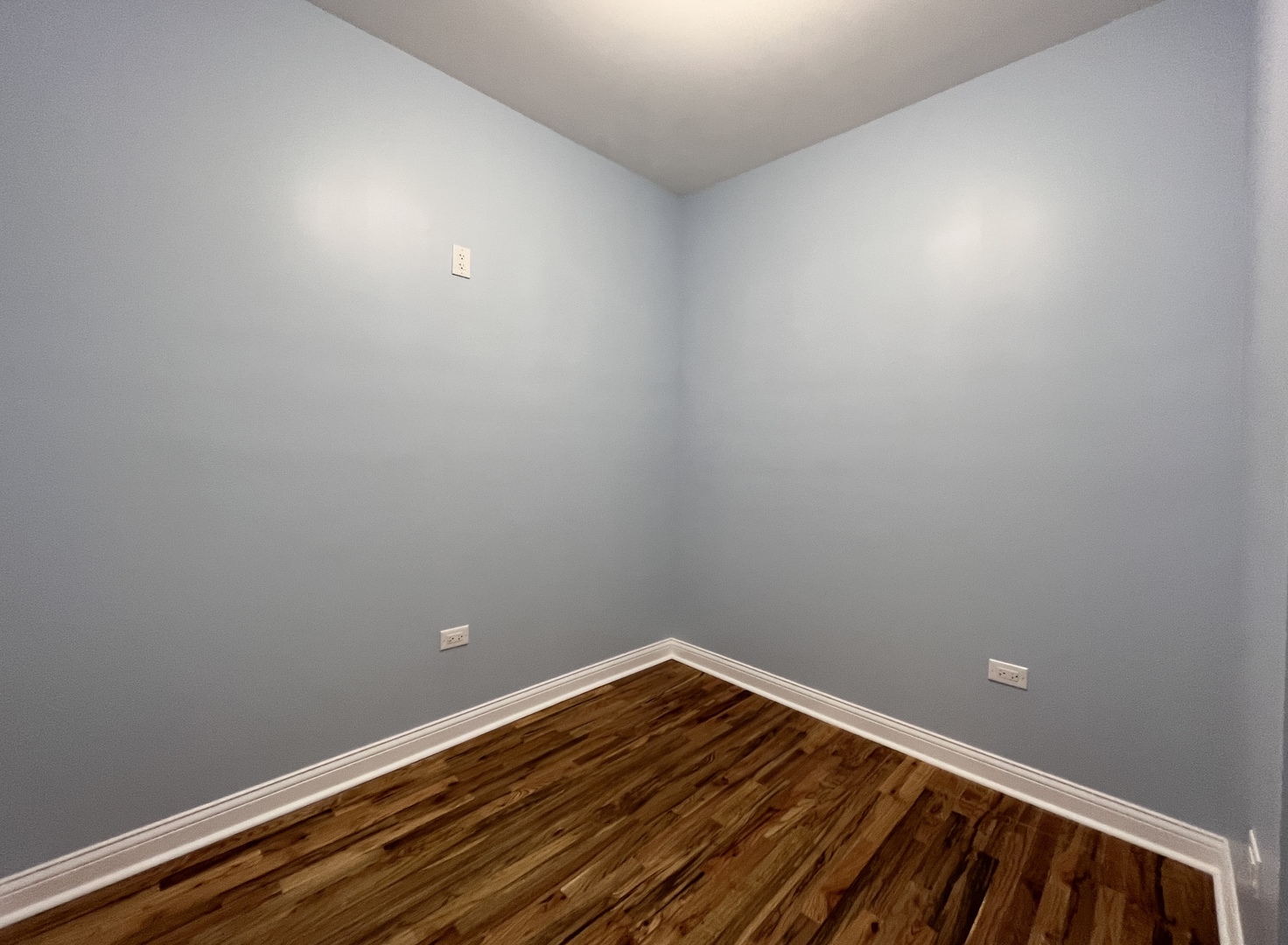 1111 North Keystone Avenue Chicago, IL 60651 - Photo 11 of 34 a view of room with wooden floor and fan